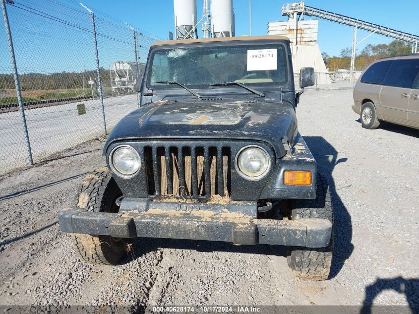 2000 Jeep Wrangler Sport VIN: 1J4FA49S1YP703915 Lot: 40628174