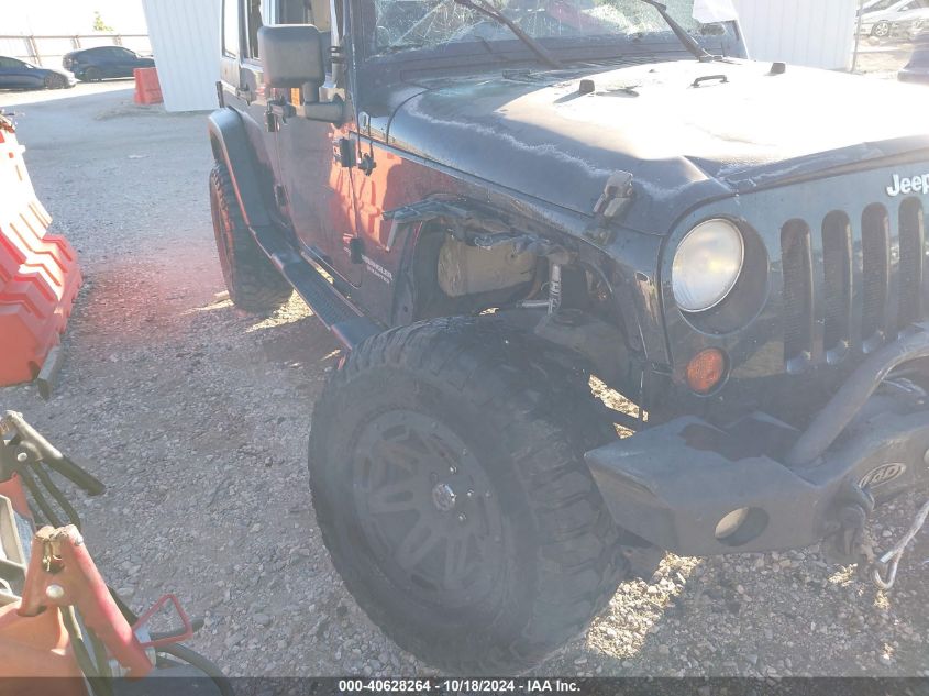 2010 Jeep Wrangler Unlimited Rubicon VIN: 1J4BA6H1XAL161083 Lot: 40628264