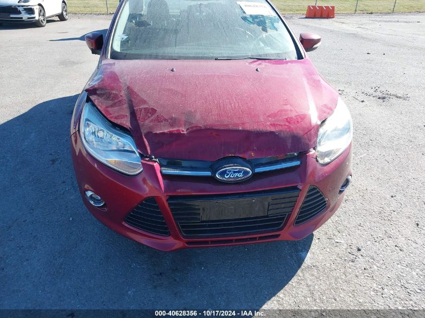 2013 Ford Focus Titanium VIN: 1FADP3J27DL199329 Lot: 40628356