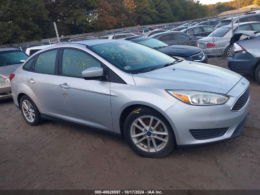 VIN 1FADP3F26JL237184 2018 Ford Focus, SE no.12