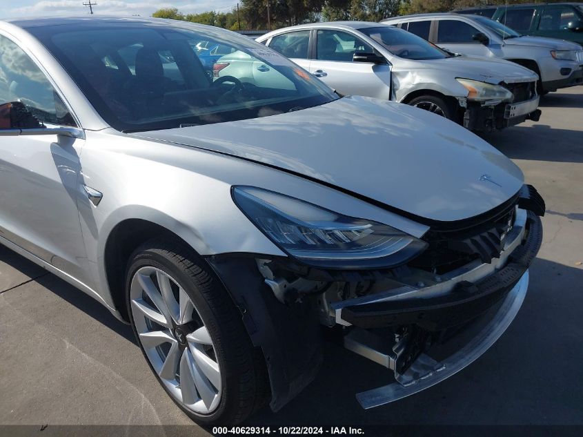 2018 Tesla Model 3 Long Range/Mid Range VIN: 5YJ3E1EA2JF031114 Lot: 40629314