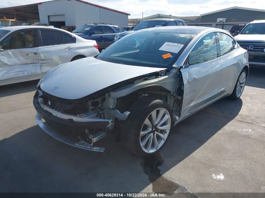 2018 Tesla Model 3 Long Range/Mid Range VIN: 5YJ3E1EA2JF031114 Lot: 40629314