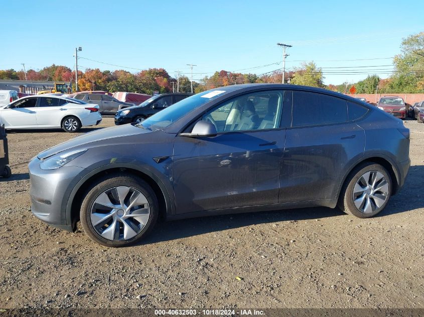 2023 Tesla Model Y Awd/Long Range Dual Motor All-Wheel Drive VIN: 7SAYGDEE7PF880560 Lot: 40632503