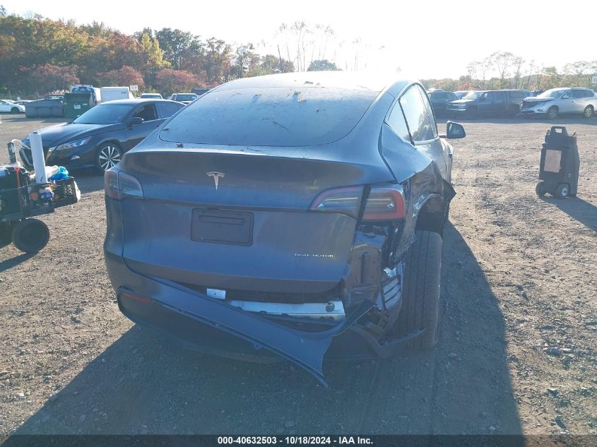 2023 Tesla Model Y Awd/Long Range Dual Motor All-Wheel Drive VIN: 7SAYGDEE7PF880560 Lot: 40632503