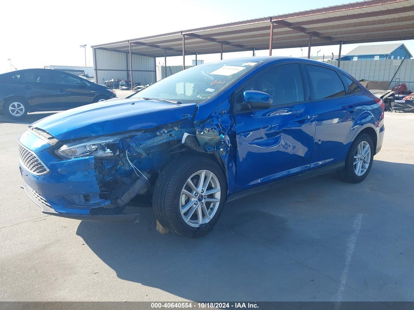 VIN 1FADP3F21JL286793 2018 FORD FOCUS SE