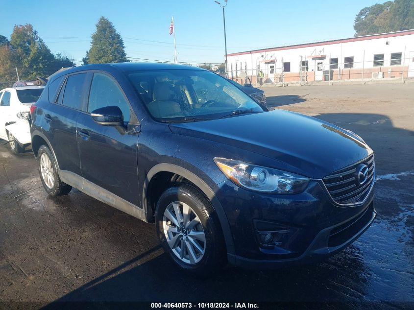 2016 Mazda Cx-5 Touring VIN: JM3KE4CY3G0874718 Lot: 40640573