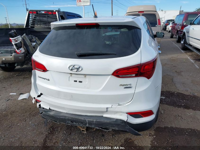 2018 Hyundai Santa Fe Sport 2.4L VIN: 5XYZTDLB1JG556848 Lot: 40641733