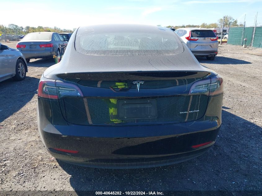 2021 Tesla Model 3 Long Range Dual Motor All-Wheel Drive VIN: 5YJ3E1EB7MF858460 Lot: 40645282