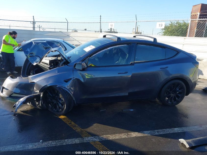 2023 Tesla Model Y Awd/Long Range Dual Motor All-Wheel Drive VIN: 7SAYGDEE4PF908539 Lot: 40646586