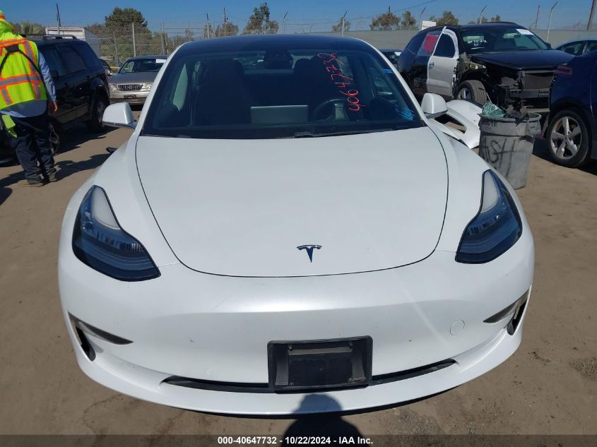 2018 Tesla Model 3 Long Range/Mid Range VIN: 5YJ3E1EA5JF017322 Lot: 40647732