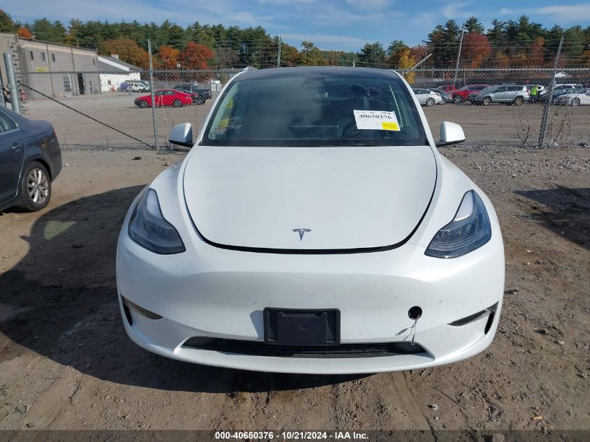 2023 Tesla Model Y Awd/Long Range Dual Motor All-Wheel Drive VIN: 7SAYGDEE9PF671031 Lot: 40650376