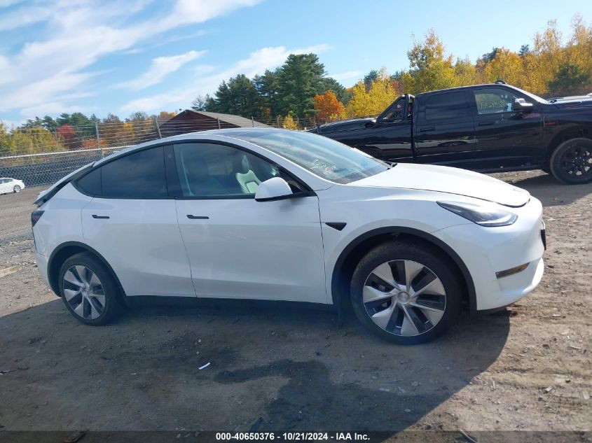 2023 Tesla Model Y Awd/Long Range Dual Motor All-Wheel Drive VIN: 7SAYGDEE9PF671031 Lot: 40650376