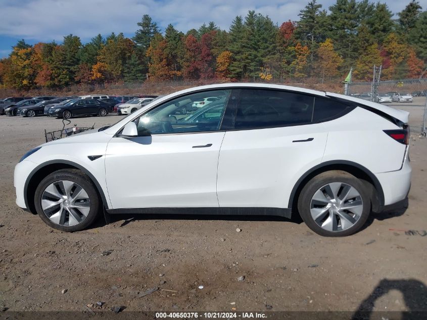 2023 Tesla Model Y Awd/Long Range Dual Motor All-Wheel Drive VIN: 7SAYGDEE9PF671031 Lot: 40650376