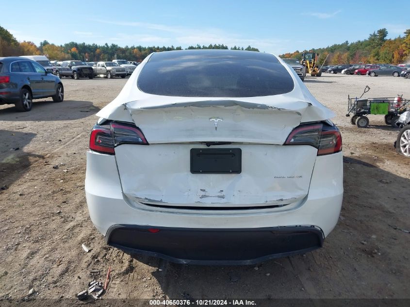 2023 Tesla Model Y Awd/Long Range Dual Motor All-Wheel Drive VIN: 7SAYGDEE9PF671031 Lot: 40650376