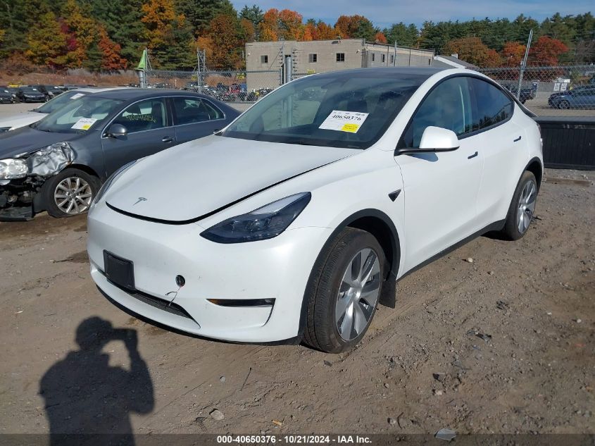 2023 Tesla Model Y Awd/Long Range Dual Motor All-Wheel Drive VIN: 7SAYGDEE9PF671031 Lot: 40650376