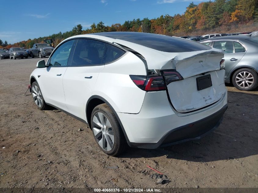 2023 Tesla Model Y Awd/Long Range Dual Motor All-Wheel Drive VIN: 7SAYGDEE9PF671031 Lot: 40650376