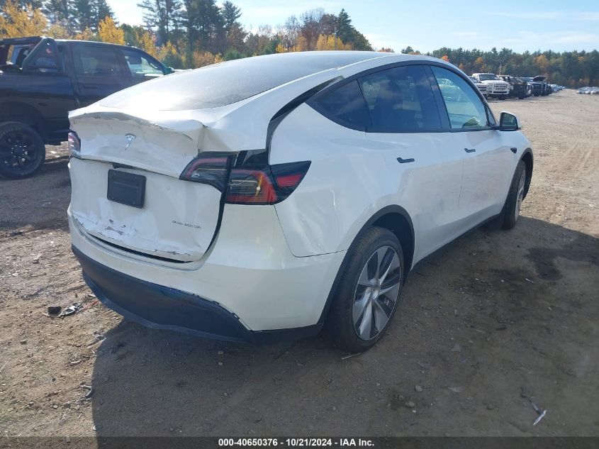 2023 Tesla Model Y Awd/Long Range Dual Motor All-Wheel Drive VIN: 7SAYGDEE9PF671031 Lot: 40650376