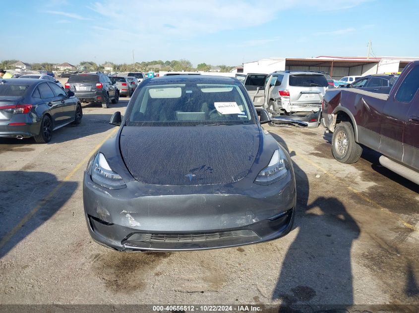 2023 Tesla Model Y Awd/Long Range Dual Motor All-Wheel Drive VIN: 7SAYGDEE9PA036680 Lot: 40656512