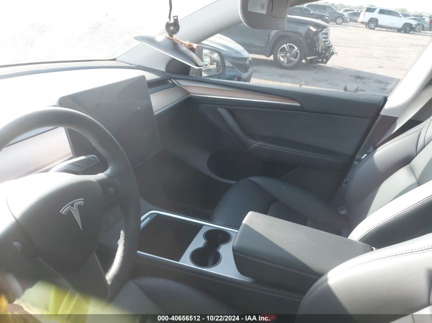 2023 Tesla Model Y Awd/Long Range Dual Motor All-Wheel Drive VIN: 7SAYGDEE9PA036680 Lot: 40656512