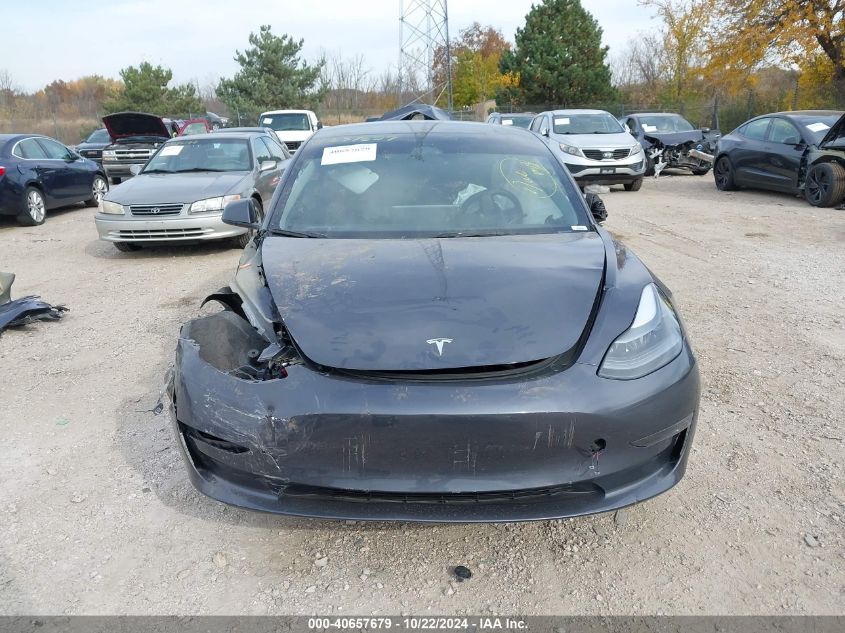 2023 Tesla Model 3 Long Range Dual Motor All-Wheel Drive VIN: 5YJ3E1EB9PF634742 Lot: 40657679