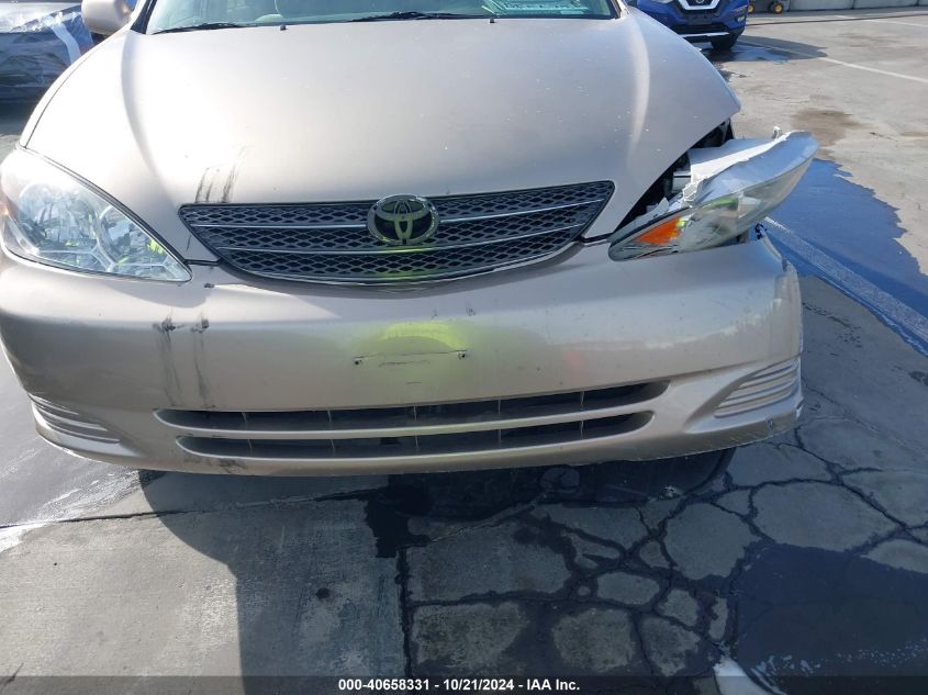 2003 Toyota Camry Le V6 VIN: 4T1BF32K83U561739 Lot: 40658331