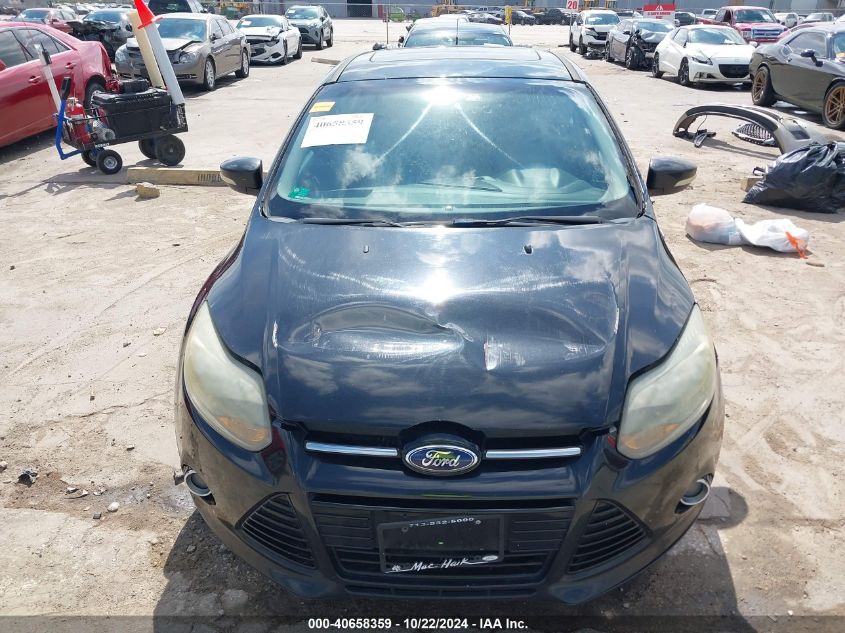 2014 Ford Focus Titanium VIN: 1FADP3J20EL309459 Lot: 40658359