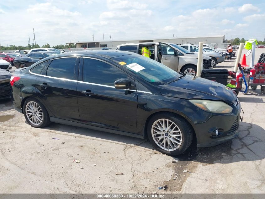 2014 Ford Focus Titanium VIN: 1FADP3J20EL309459 Lot: 40658359