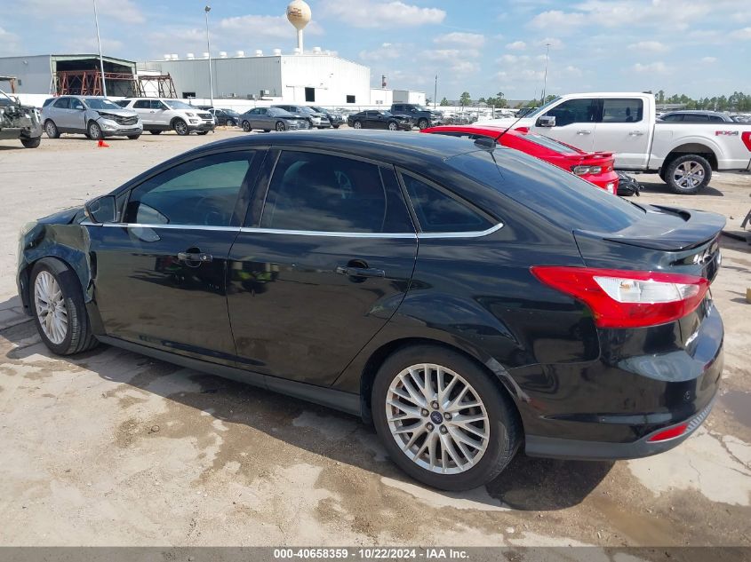 2014 Ford Focus Titanium VIN: 1FADP3J20EL309459 Lot: 40658359