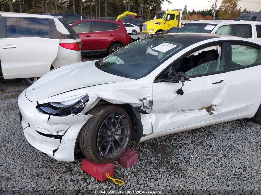 2023 Tesla Model 3 Long Range Dual Motor All-Wheel Drive VIN: 5YJ3E1EB7PF603408 Lot: 40658969