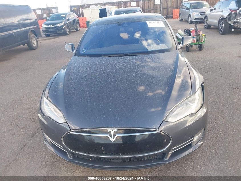 2014 Tesla Model S VIN: 5YJSA1H20EFP63677 Lot: 40659207