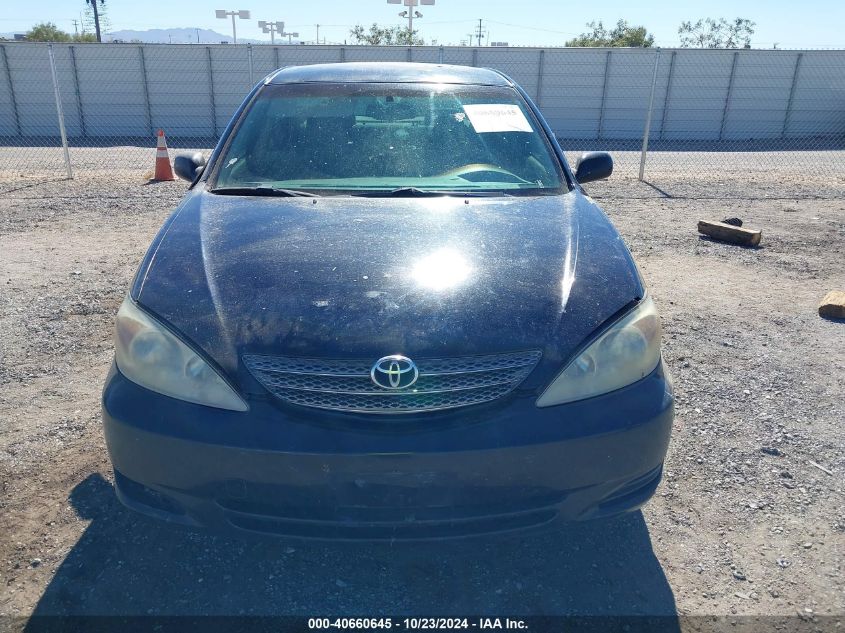 2003 Toyota Camry Le VIN: JTDBE32K030234203 Lot: 40660645