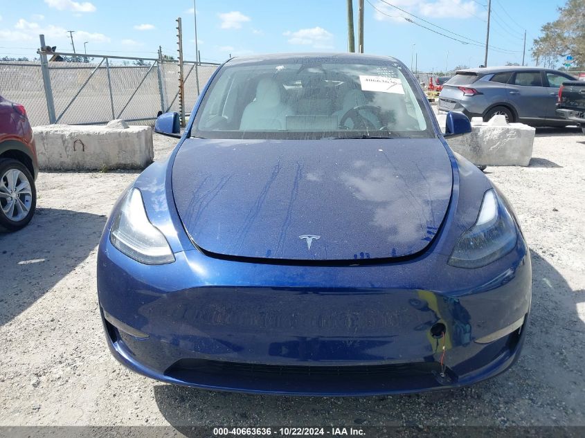 2023 Tesla Model Y Awd/Long Range Dual Motor All-Wheel Drive VIN: 7SAYGAEE5PF826303 Lot: 40663636