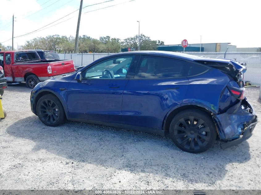 2023 Tesla Model Y Awd/Long Range Dual Motor All-Wheel Drive VIN: 7SAYGAEE5PF826303 Lot: 40663636