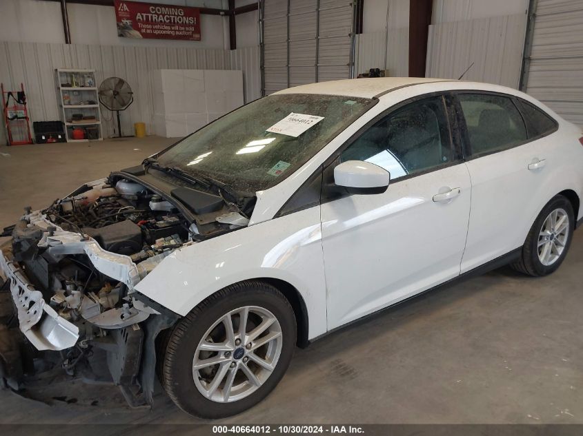 2018 Ford Focus Se VIN: 1FADP3F24JL250595 Lot: 40664012