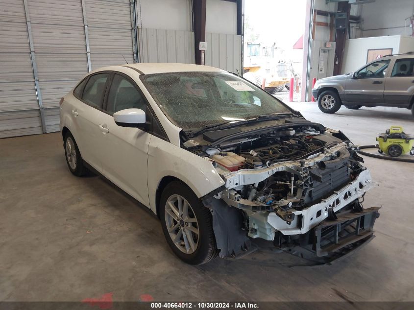 VIN 1FADP3F24JL250595 2018 FORD FOCUS no.1