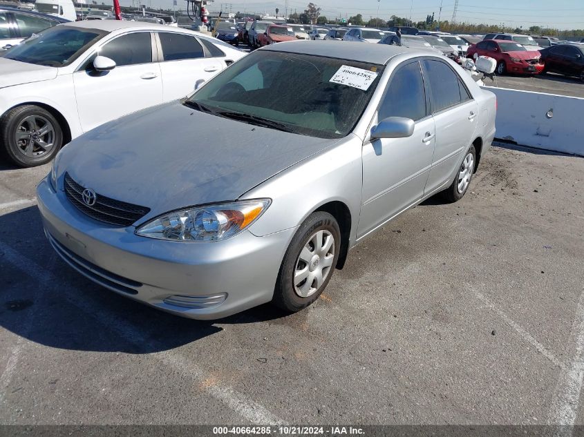 2003 Toyota Camry Le VIN: 4T1BE32K13U679392 Lot: 40664285