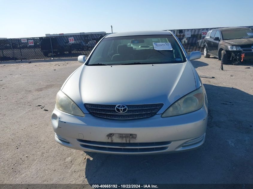 2003 Toyota Camry Le VIN: JTDBE32KX30244432 Lot: 40665192