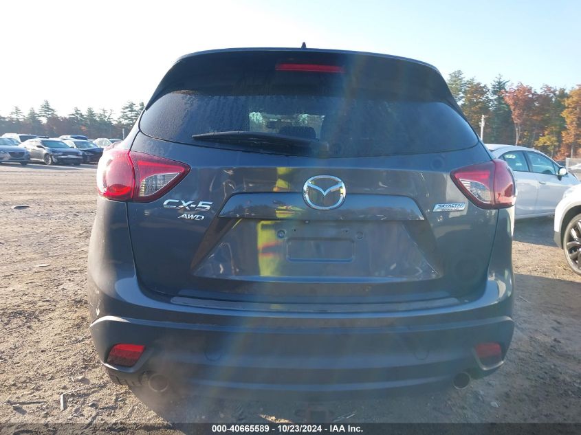 2014 Mazda Cx-5 Touring VIN: JM3KE4CY7E0311815 Lot: 40665589