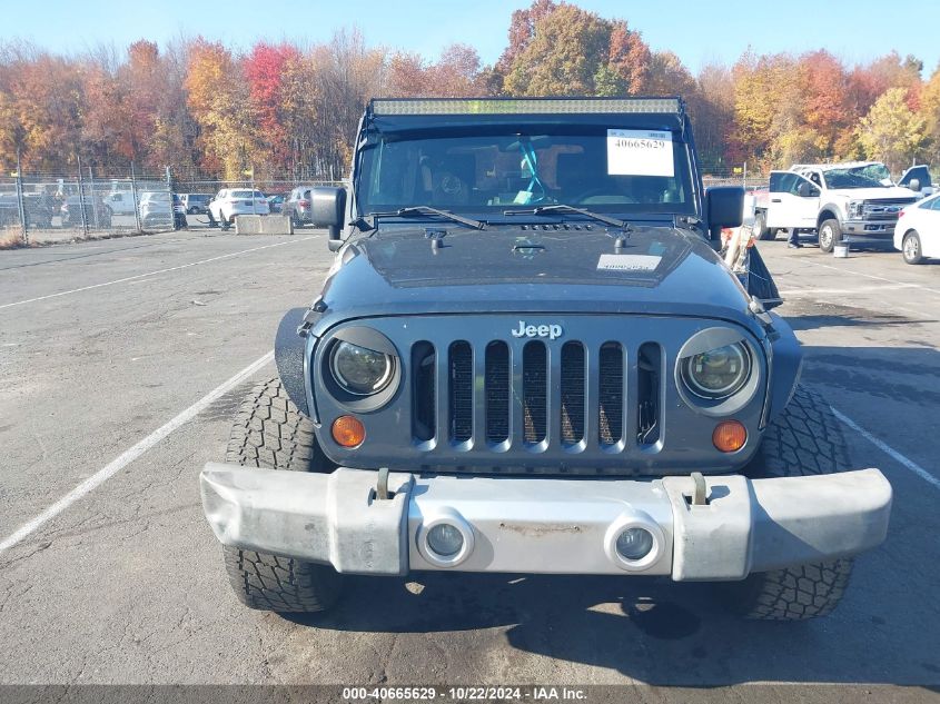 2008 Jeep Wrangler Unlimited Sahara VIN: 1J8GA591X8L603142 Lot: 40665629