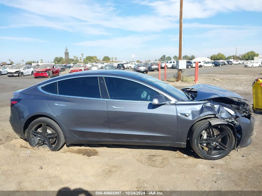 2019 Tesla Model 3 VIN: 5YJ3E1EAXKF417247 Lot: 40665997