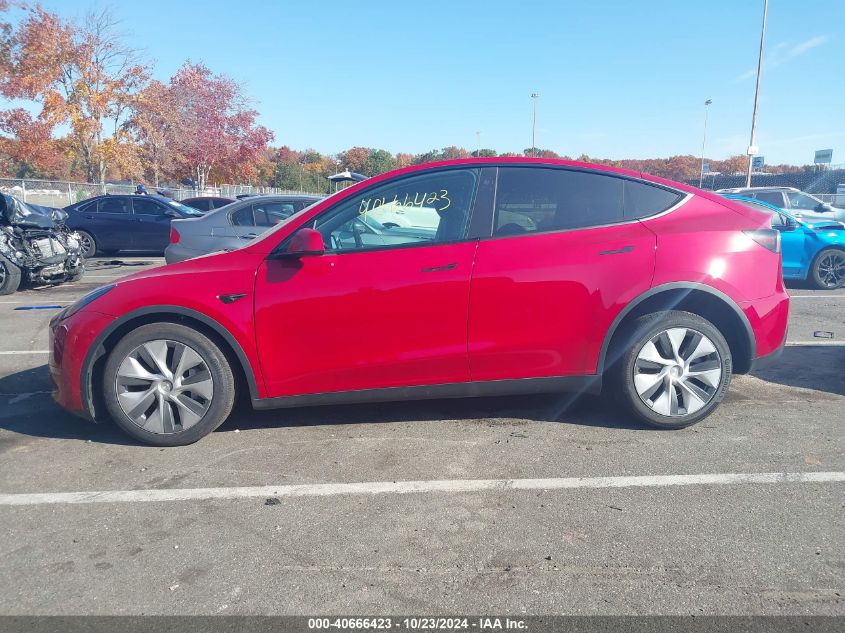 2023 Tesla Model Y Awd/Long Range Dual Motor All-Wheel Drive VIN: 7SAYGDEE2PF758513 Lot: 40666423