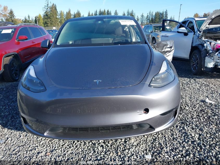 2024 Tesla Model Y VIN: 7SAYGDEE1RF200705 Lot: 40667170