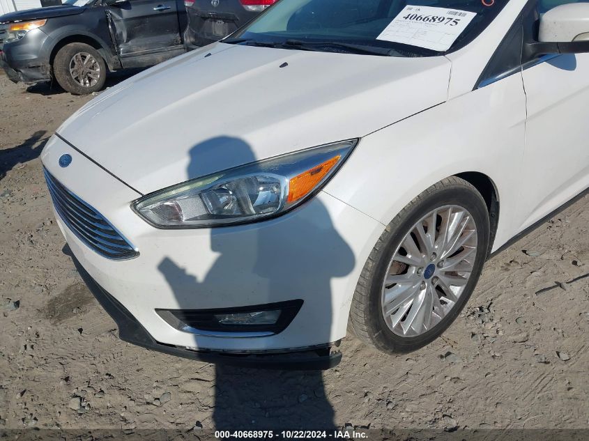 2018 Ford Focus Titanium VIN: 1FADP3N29JL331660 Lot: 40668975