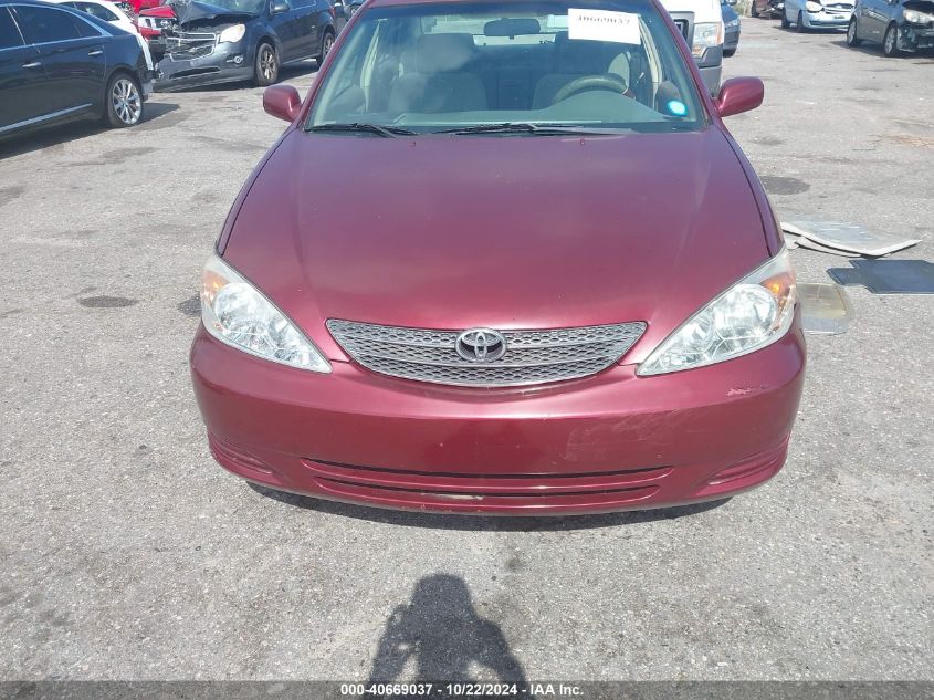 2003 Toyota Camry Le V6 VIN: 4T1BF32K23U057316 Lot: 40669037