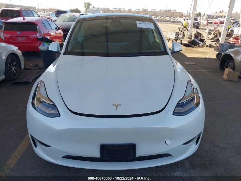 2023 Tesla Model Y Awd/Long Range Dual Motor All-Wheel Drive VIN: 7SAYGDEE8PA032541 Lot: 40670053