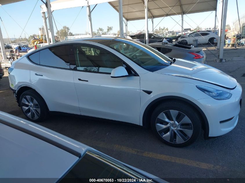 2023 Tesla Model Y Awd/Long Range Dual Motor All-Wheel Drive VIN: 7SAYGDEE8PA032541 Lot: 40670053