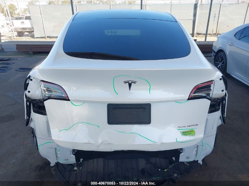 2023 Tesla Model Y Awd/Long Range Dual Motor All-Wheel Drive VIN: 7SAYGDEE8PA032541 Lot: 40670053