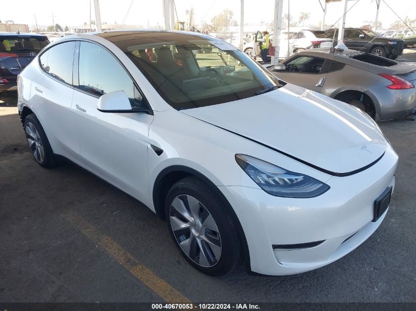 2023 Tesla Model Y Awd/Long Range Dual Motor All-Wheel Drive VIN: 7SAYGDEE8PA032541 Lot: 40670053