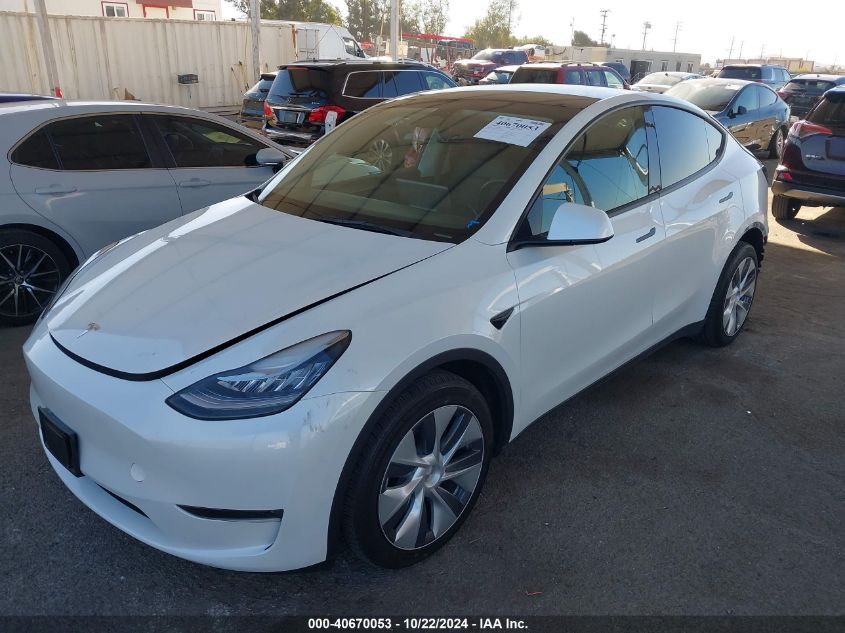 2023 Tesla Model Y Awd/Long Range Dual Motor All-Wheel Drive VIN: 7SAYGDEE8PA032541 Lot: 40670053