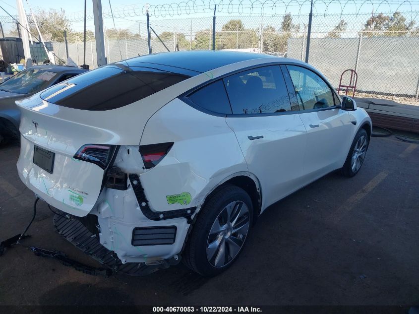 2023 Tesla Model Y Awd/Long Range Dual Motor All-Wheel Drive VIN: 7SAYGDEE8PA032541 Lot: 40670053